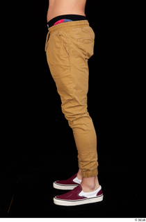 Pablo brown trousers dressed leg lower body red sneakers 0003.jpg